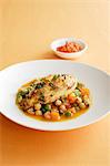 Bowl of chicken with chickpeas