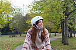 Woman riding bicycle in park