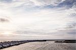 Clouds over rocky coastline