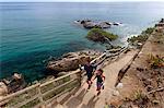 Couple running on paved steps