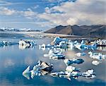 Glaciers floating in still water