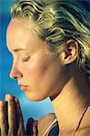 Close up of woman praying