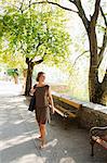 Woman on path with trees