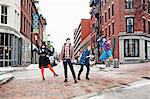 Women posing on street, LGBT community