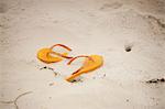 Flip flops in sand