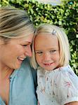 Mother and daughter, smiling, portrait