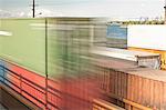 Train passing container shipyard