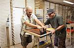 Men printing with silk screen equipment