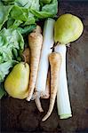 Fresh organic leeks, parsnips and pears, studio shot