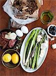 Studio shot of asparagus, surrounded by other ingredients