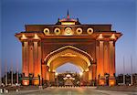 Illuminated entrance to Emirates Palace hotel, Adu Dhabi, United Arab Emirates