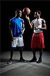 Studio shot of two basketball players