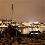 Docked boat and river Douro at night, Porto, Portugal