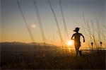 Female trail runner on the Bonneville Shoreline Trail , Banff National Park, Alberta, Canada