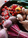 Still life of fresh vegetables and mushrooms with vine tomatoes, beetroot and zucchini