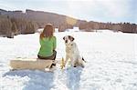 Woman bonding with pet dog