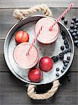 Fresh fruit smoothies with nectarines and blackberries