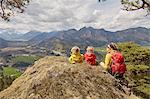 Mother and sons, looking at mountain view, Garmisch-Partenkirchen, Bavaria, Germany