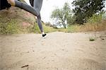 Jogger running in park, Stoney Point, Topanga Canyon, Chatsworth, Los Angeles, California, USA