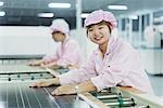 Female workers in solar panel assembly factory, Solar Valley, Dezhou, China