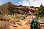 Hiker looking at rocky landscape