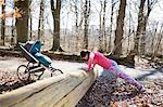 Woman exercising in forest