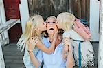 Happy mother with two daughter