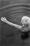 Boy swimming in water