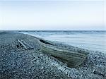 Rowing boat on pebble beach