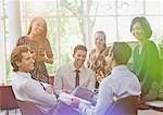 Business people talking in conference room meeting