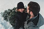 Father and daughter out getting their own Christmas tree