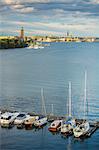 Boats, Stockholm City Hall on background, Sweden