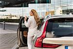 Woman leaving car