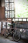 Old bicycle stored in shed