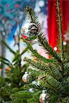 Ornaments hanging on christmas tree