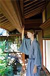 Caucasian man wearing yukata in traditional Japanese house