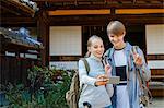 Caucasian couple at traditional Japanese house