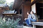 Caucasian couple at traditional Japanese house