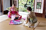 Caucasian woman wearing yukata at traditional Japanese house