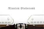 The phrase Mission Statement typed on retro typewriter.