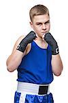 Young handsome boxer sportsman in blue boxer suit and black wrist wraps standing on white backgound. Isolated. Copy space.