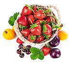 Berries healthy eating fruits harvest strawberries wicker basket still life, isolated on white background top view