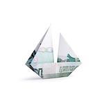 origami ship from banknotes on a white background