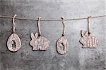 Traditional Easter decoration bunnies hanging on a string