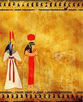 Grunge background with old stucco texture of yellow color and Egyptian goddess Isis image