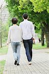 Japanese couple in a city park