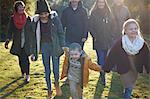 Family enjoying sun in garden