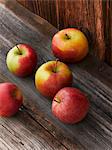 Fresh apples on a wooden table