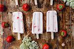 Buttermilk and strawberry ice lolly