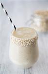 A power smoothie with almond milk, banana and oats